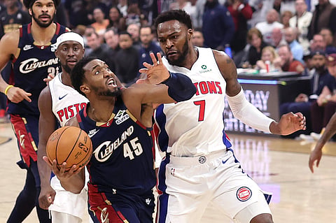 Cleveland Cavaliers and Detroit Pistons players in action