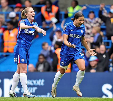Sam Kerr celebrates her goal against Manchester United