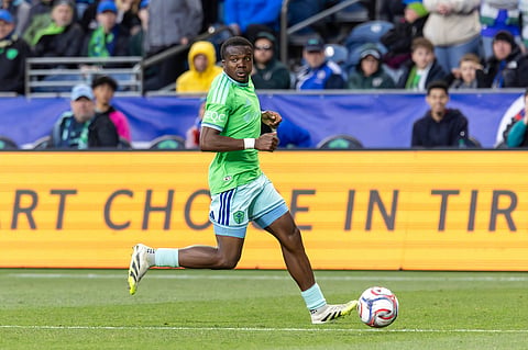 Seattle Sounders defender Nouhou Tolo moves forward with the ball