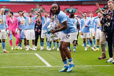 FA Cup hero Antoine Semenyo celebrates with the FA Cup trophy