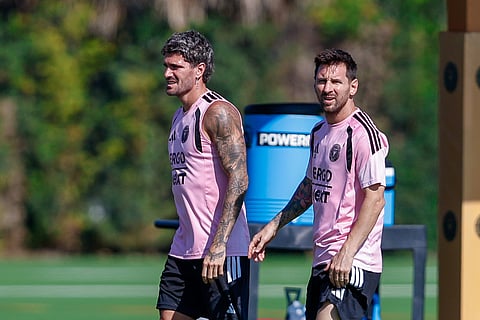 Rodrigo de Paul and Lionel Messi during training session