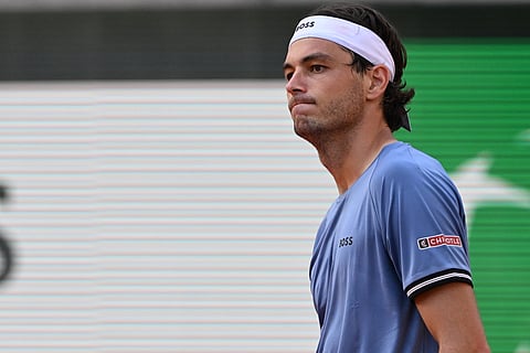 Taylor Fritz reacts after losing out to Nishesh Basavareddy