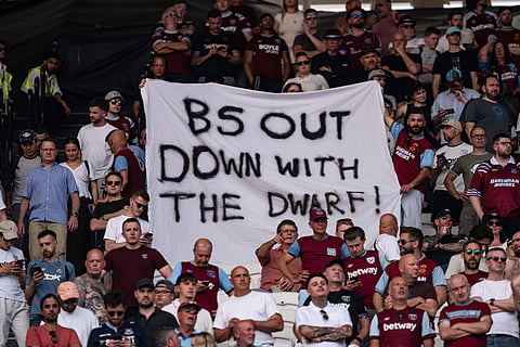 West Ham United fans hold up a protest banner at the London Stadium