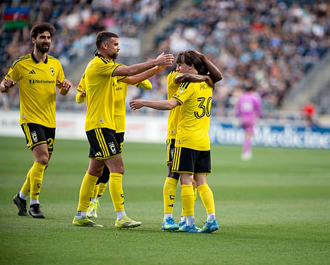 Columbus Crew players celebrate a goal in the MLS