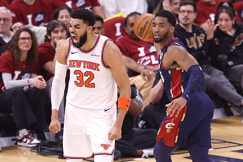 Karl-Anthony Towns celebrates a point against Cleveland Cavaliers