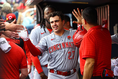 Cincinnati Reds' Sal Stewart is congratulated in the dugout