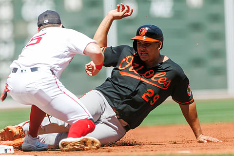 Baltimore Orioles and Boston Red Sox players in action