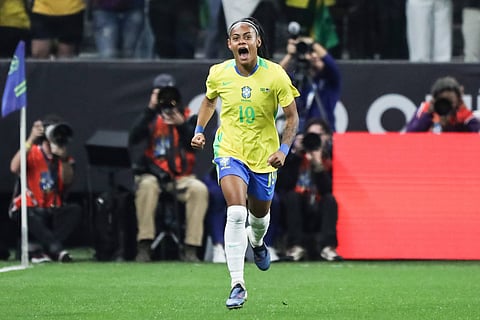 Taina Maranhao celebrates her goal against USA