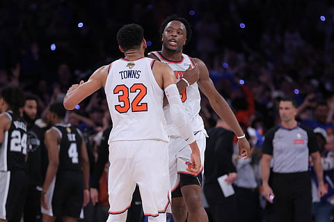 OG Anunoby celebrates with Karl Anthony Towns