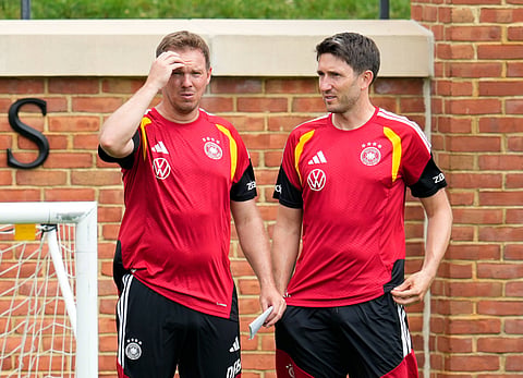 Julian Nagelsmann with assistant coach Benjamin Glueck during training session