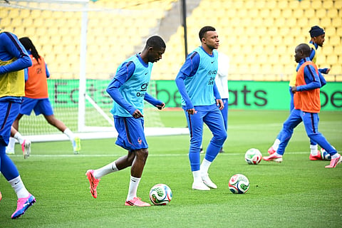 Ousmane Dembele with Kylian Mbappe during training session