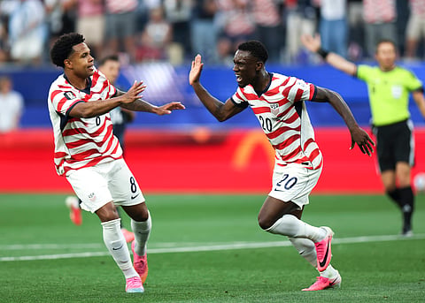 Folarin Balogun celebrates after scoring against Paraguay