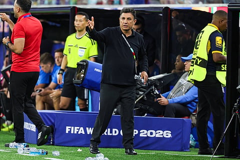 Iran coach Amir Ghalenoei on the touchline against New Zealand