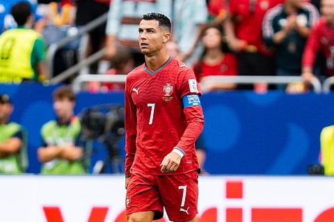 Cristiano Ronaldo looks to the sky during their match against DR Congo