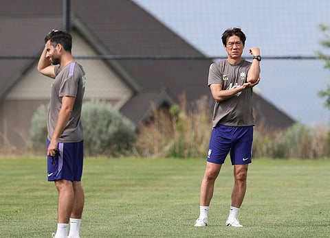South Korea coach Hong Myung-bo looks on during training session