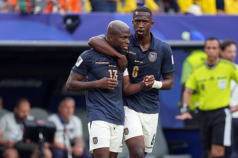 Enner Valencia and Willian Pacho of Ecuador in action against Ivory Coast
