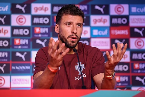 Ruben Dias during a press conference