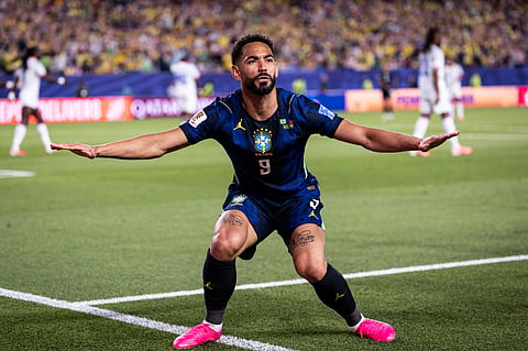 Matheus Cunha celebrates after scoring against Haiti