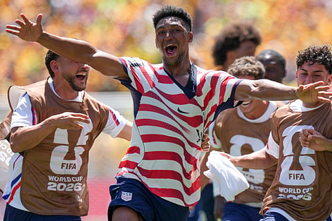 Alex Freeman celebrates after scoring the second goal for USA