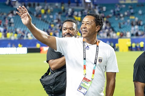 Bubista waves to the fans after full-time against Uruguay
