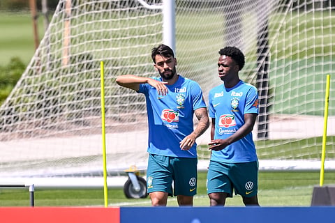 Lucas Paqueta with Vinicius Jr during training session