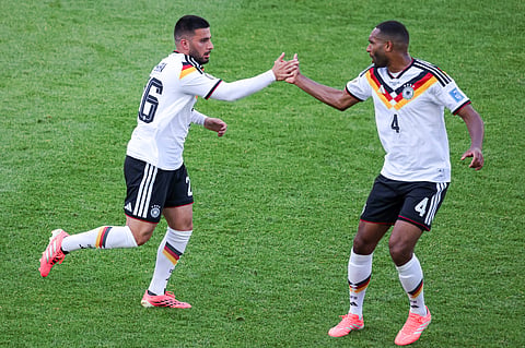 Deniz Undav and Jonathan Tah of Germany