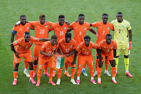 Ivory Coast players line up for a team photo