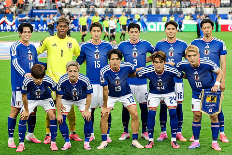 Japan players pose for a team photo