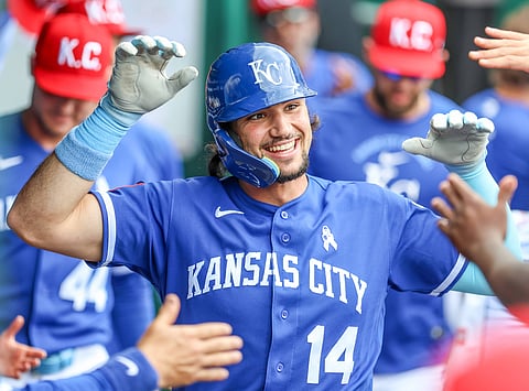 Jac Caglianone celebrates in the dugout