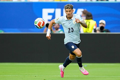 Maxi Araujo of Uruguay in action