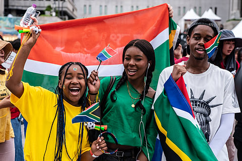 South African fans cheer at the Gwanghwamum Square