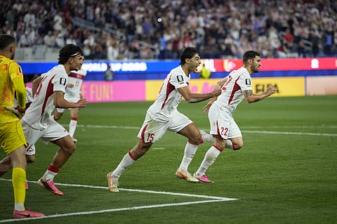 Kaan Ayhan celebrates his last-minute winner against USA