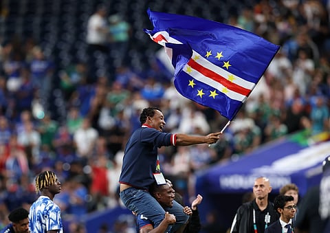 Bubista is lifted onto the shoulders of his players after guiding his team to the knockout stage