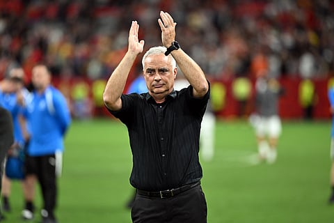 Darren Bazeley applauds the fans at full-time against Belgium