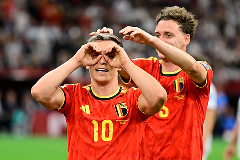 Leandro Trossard celebrates after scoring his second goal against New Zealand