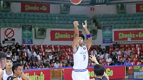 ICE IN HIS VEINS. Ateneo de Cebu’s Jared Bahay canned a three-pointer with two seconds remaining to give the Magis Eagles the victory over USPF.