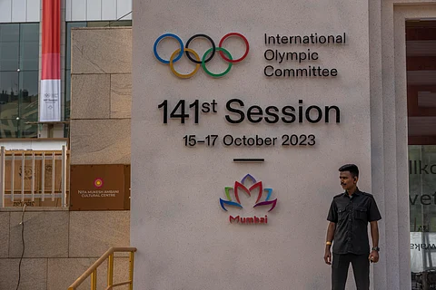 India IOC Meeting
A security guard stands at the entrance of a venue ahead of the upcoming 141st International Olympic Committee (IOC) session in Mumbai, India, Thursday.
