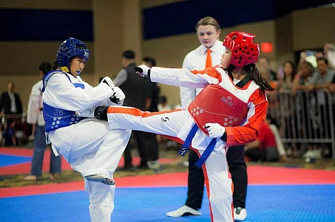 Davao City-born taekwondo ace Alani Uy Labrador (right, in red) secures three gold medals at the Las Vegas Open Championship on October 7 in Las Vegas, Nevada, USA.