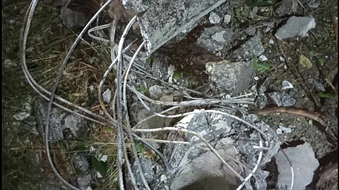 ZAMBOANGA. An improvised bomb explosion topples a concrete post of the Zamboanga City Electric Cooperative (Zamcelco) in Tumitus village, east of this city on Friday, November 3. A photo handout shows the electric post destroyed by an Ammonium Nitrate Fuel Oil (ANFO) type of explosive.