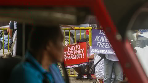 'NO TO JEEPNEY PHASEOUT'. A member of Transmision-Piston calls for a continuation of jeepney operation during the Bonifacio Day rally at Freedom Park, along Roxas Ave., Poblacion District, Davao City, on November 30, 2023.