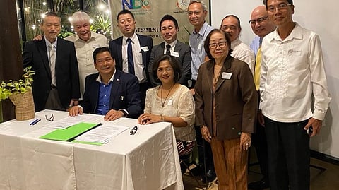 GROWING. The Davao Thermo Biotech Corporation (DTBC) board of directors posing with National Development Corporation general manager Anton DC Mauricio and DTBC President and chief executive officer Olive Puentespina (seated) after the contract signing.