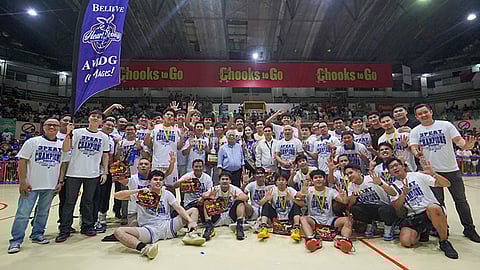 SECOND THREE-PEAT. Players, coaches and supporters of the Ateneo de Cebu Magis Eagles celebrate after completing their second “three-peat” in the Cesafi high school basketball wars. / RONEX TOLIN