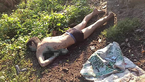 MISUKOL: Si Jenecy Rafols, alyas Atong Bacalso Rafols, suspek sa pagpusil-patay kang Police Corporal Ryan Languido Baculi niadtong Nobiyembre 15, 2023, atol sa buy-bust sa kapulisan sa Barangay Kinasang-an, dakbayan sa Sugbo, napatay human nisukol sa kapulisan nga nag-serve sa iyang warrant of arrest sa Purok 2 Campo, Barangay Tapul, dakbayan sa Talisay, alas 6:15 sa buntag, Miyerkules, Disyembre 13, 2023. / Tampo
