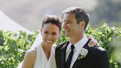 JUST MARRIED! In this image supplied by Dame Jacinda Ardern and Clarke Gayford, former New Zealand Prime Minister Jacinda Ardern embraces her husband Clarke Gayford at their wedding in Havelock North, New Zealand, Saturday, Jan. 13, 2024. After almost five years of engagement and a postponement due to the coronavirus pandemic, Ardern has married longtime partner Gayford in a private ceremony at a central North Island winery.