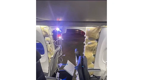 This photo provided by an unnamed source shows the damaged part of an Alaska Airlines Boeing 737 Max 9, Flight 1282, which was forced to return to Portland International Airport on Friday, January 5, 2024.