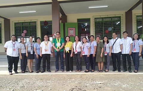 LEYTE. Education and village officials, students, and teachers pose at the new school building under the Department of Education’s “Last Mile Schools” program in San Miguelay Elementary School in Sta. Fe town in Leyte on November 23, 2023.