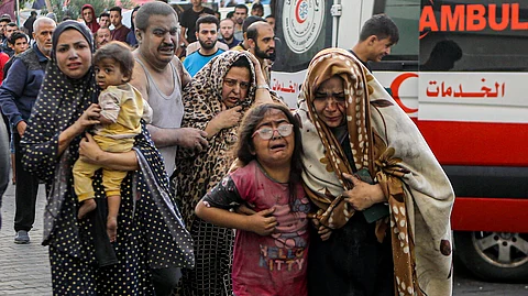 INJURED Palestinians arrive at al-Shifa Hospital following Israeli airstrikes on Gaza City, central Gaza Strip, Monday, Oct. 16, 2023. Israel is sending top legal minds, including a Holocaust survivor, to The Hague this week to counter allegations that it is committing genocide against Palestinians in Gaza.