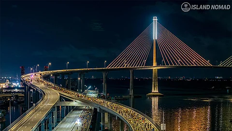 FINAL STRETCH. The 18 kilometers from the Cebu-Cordova Link Expressway to SM Seaside City Cebu serve as the last stretch for runners of the 42K and 24K legs of the Cebu Marathon 2024 on Sunday, January 14, 2024. More than 8,000 runners participated in the race.