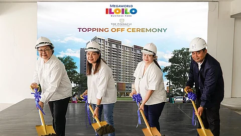 ILOILO. Photo leading the ceremonial topping-off ceremony (from left): Engineer Daisy Villanueva, head of operations for Iloilo Business Park, Megaworld; Architect Astrid Cruz, head of construction management, Megaworld; Jennifer Palmares-Fong, head of sales and marketing, Megaworld Visayas; and Engineer Jeffrey Buton, Construction Manager, Megaworld.
