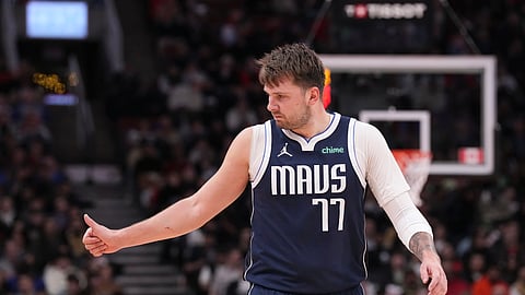 Dallas Mavericks' Luka Doncic reacts during his team's win over the Toronto Raptors in an NBA basketball game in Toronto on Wednesday, Feb. 28, 2024.